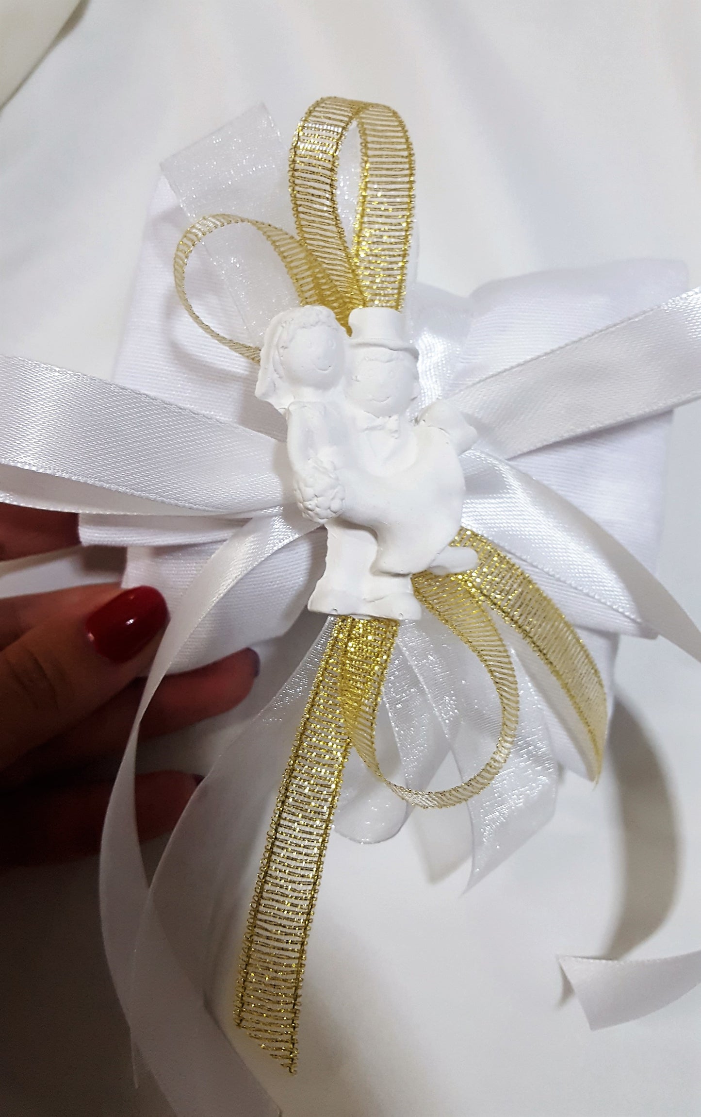 pochette con sposini nastro oro per anniversario di matrimonio