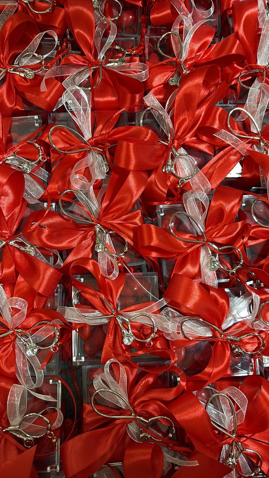 Fonendoscopio confezionato con confettata rossa in scatola Plexiglass