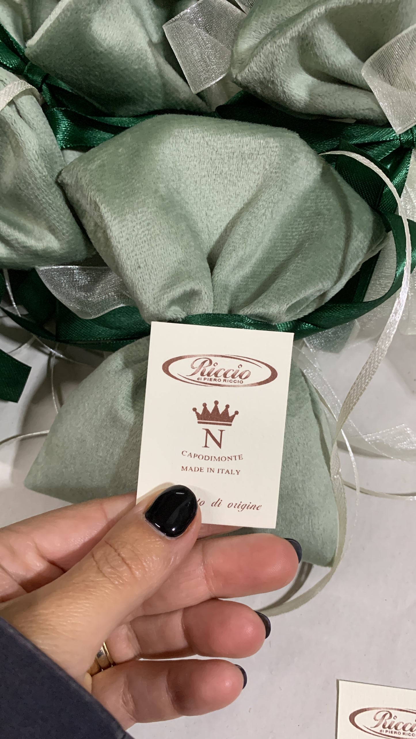 Stella Natale bianca con appendino su sacchetto velluto