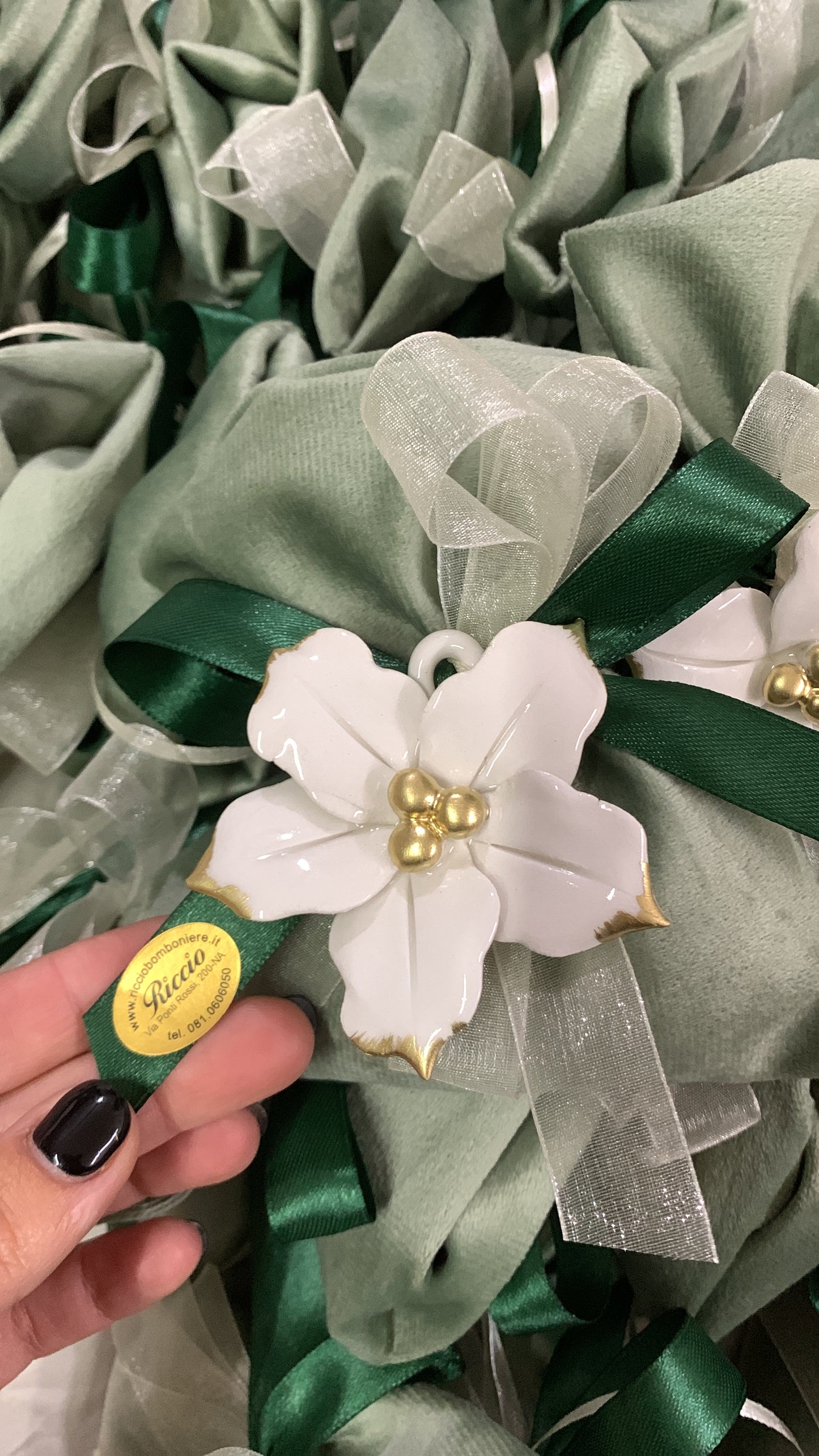 Stella Natale bianca con appendino su sacchetto velluto