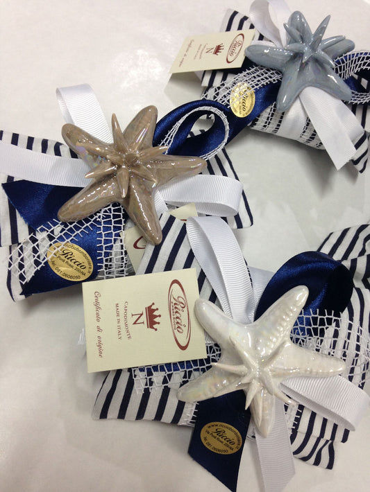 Stella marina con riccetto confezionata su pochette